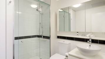 Shower, hair dryer, towels, soap