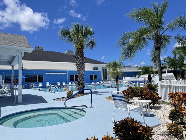 A heated pool - RV Site for Rent at The Great Outdoors Resort backed up to the 14th green (Titusville)