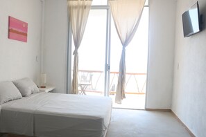 1 slaapkamer, een strijkplank/strijkijzer, internet, beddengoed