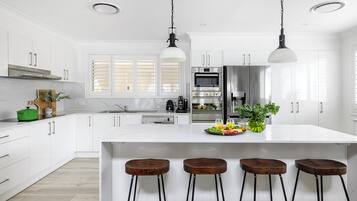 Coffee/tea maker, fridge, microwave, oven