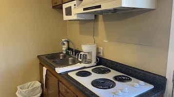 Fridge, microwave, stovetop, coffee/tea maker