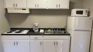 Fridge, microwave, stovetop, coffee/tea maker