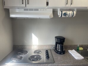 Fridge, microwave, stovetop, coffee/tea maker
