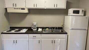 Fridge, microwave, stovetop, coffee/tea maker