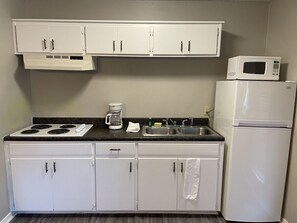Fridge, microwave, stovetop, coffee/tea maker