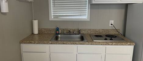 Fridge, microwave, stovetop, coffee/tea maker