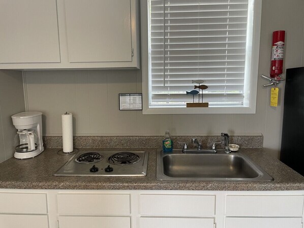 Fridge, microwave, stovetop, coffee/tea maker