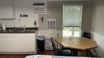 Fridge, microwave, stovetop, coffee/tea maker