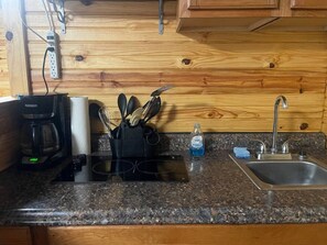 Fridge, microwave, stovetop, coffee/tea maker