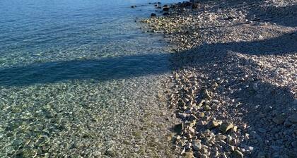 Beachfront summer retreat, amazing sea views, nature and sea terraces comfort.