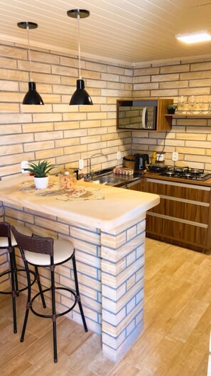 Mini-fridge, microwave, stovetop, toaster