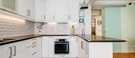 Fridge, stovetop, cookware/dishes/utensils