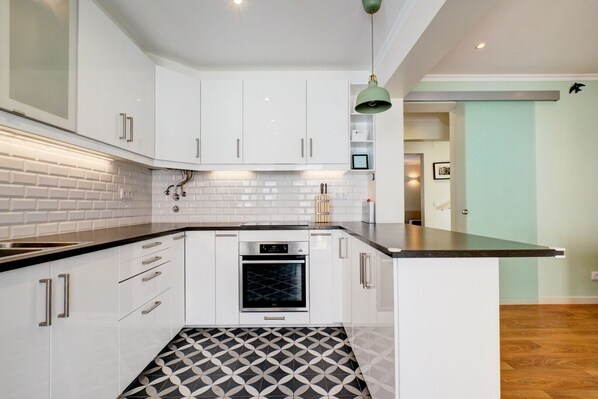 Fridge, stovetop, cookware/dishes/utensils