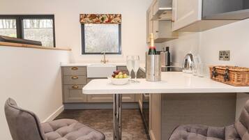 Fridge, electric kettle, toaster, cookware/dishes/utensils