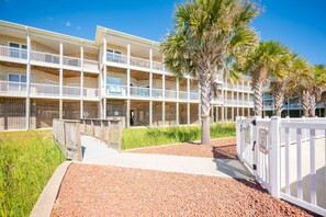 Exterior - Beachside Breeze: Modern Condo in Walking Distance to Beach, Dining, Shops (Oak Island)