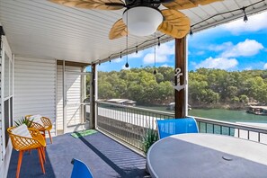 Outdoor dining - Single-level lake-view condo with dock, outdoor pool, washer/dryer, & central AC (Lake Ozark)