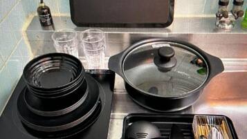 Fridge, microwave, stovetop, cookware/dishes/utensils