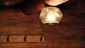 A hexagonal glass pendant light fixture with a visible bulb, hanging from a wooden ceiling. - Bbuilding log house  Capacity 6 people With B / County Market Gifu (Gujo City)