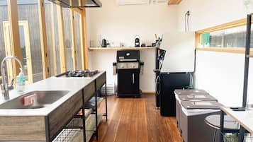 Fridge, microwave, cookware/dishes/utensils