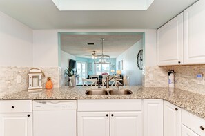 Condo, Multiple Beds, Pool View (Anna Maria Island Beach Waves) | Private kitchen | Full-size fridge, microwave, oven, stovetop