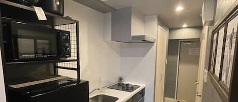 Fridge, microwave, stovetop, cookware/dishes/utensils