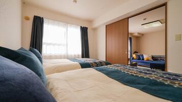 2 slaapkamers, een strijkplank/strijkijzer, gratis wifi, beddengoed