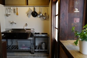 Fridge, microwave, stovetop, cookware/dishes/utensils