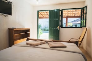 Premium Room | Minibar, bed sheets - Pousada El Camenito (Búzios)