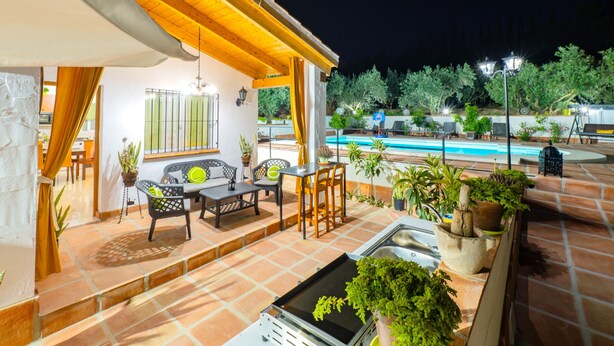 A patio with outdoor seating, a pool, and a view of the surrounding landscape. - Cubo's Casa Rural Entre Olivos del Azahar / private pool / air conditioning / free wifi (Alhaurin de la Torre)