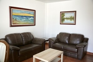 Family Apartment | Living area | 50-inch Smart TV with digital channels, streaming services - Temazcalito Loft (Tultitlan)