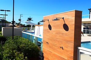2 outdoor pools, pool umbrellas, pool loungers
