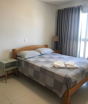 Apartamento premium, acesso à piscina, vista para a praia | 2 quartos, roupas de cama premium, individualmente decorados