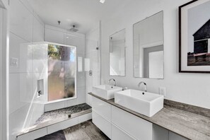 Eco-friendly toiletries, hair dryer, towels