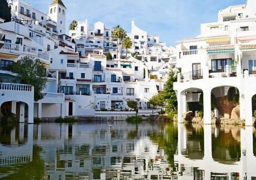 Spektakuläre Wohnung in der schönsten und grünsten Urbanisation von Nerja!