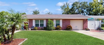 Sun-filled oasis with furnished patio, shared pool, & fire pit - dog-friendly