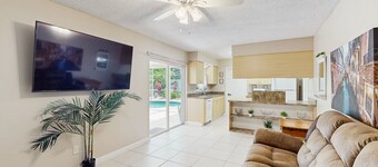 Sun-filled oasis with furnished patio, shared pool, & fire pit - dog-friendly