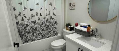 Hair dryer, towels, soap, shampoo