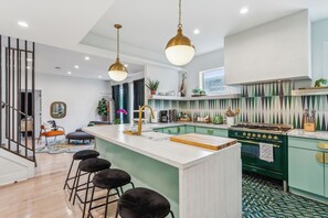 Fridge, microwave, oven, stovetop - Welcome to Midtown Muse — a bold 3BR/3BA retreat where artful design and luxe finishes set the tone. Enjoy layered textures, curated style, and walkability to Piedmont Park. Perfect for travelers seeking comfort, creativity, and a central location. (Atlanta)