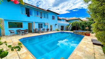 Outdoor pool, open 8:00 AM to 8:00 PM, pool umbrellas, pool loungers