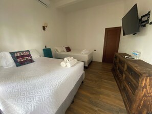 Luxury Quadruple Room, 2 Queen Beds | Desk, laptop workspace, free WiFi - MAYAN SURF HOTEL (Sipacate)