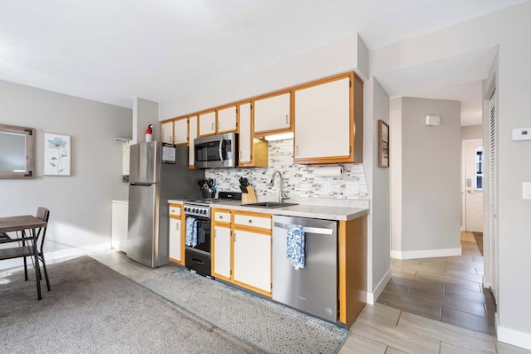 Condo, 1 King Bed with Sofa bed, Patio, Garden View (The Memorable Place) | Private kitchen