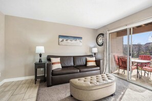 Condo, 1 King Bed with Sofa bed, Patio, Garden View (The Memorable Place) | Living area