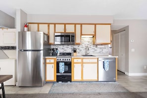 Condo, 1 King Bed with Sofa bed, Patio, Garden View (The Memorable Place) | Private kitchen