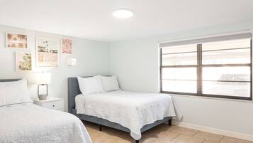 Condo, Multiple Beds, Patio, Pool View (Shoot the Breeze at Cocoa Beach) | 2 bedrooms, individually decorated, individually furnished, free WiFi