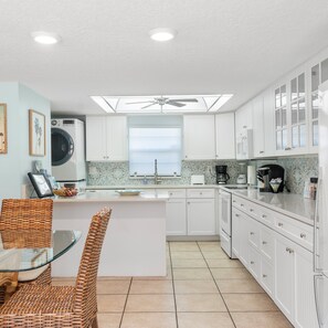 Condo, Multiple Beds, Patio, Pool View (Shoot the Breeze at Cocoa Beach) | Private kitchen | Fridge, microwave, oven, stovetop