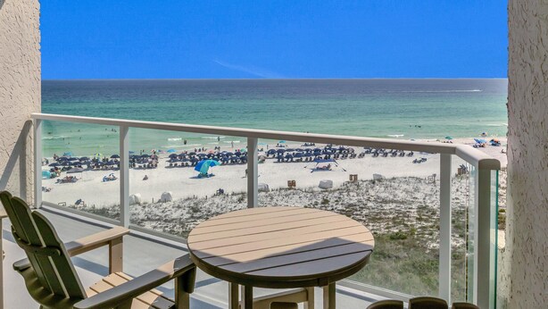 A balcony with a view of a beach. - Gulf Views & Golf Cart: Luxe Seaside Retreat (Miramar Beach)