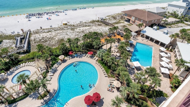 A resort with a large pool, beach access, and a view of the ocean. - "Sunset Splendor: West-Facing 3-Bed, 3-Bath Oasis on the 9th Floor at Westwinds" at Sandestin Golf and Beach Resort! (Miramar Beach)