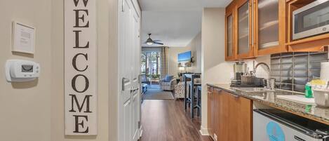 Fridge, microwave, coffee/tea maker, high chair