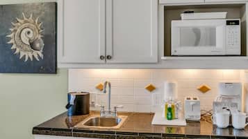 Fridge, microwave, coffee/tea maker, highchair