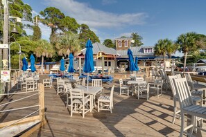 Outdoor dining - Market Street One-Bedroom Retreat - Your Cozy Haven in the Village of Baytowne Wharf at Sandestin Golf and Beach Resort! (Miramar Beach)